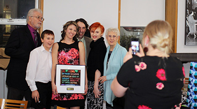 Jennifer Duggleby celebrates her award with her family