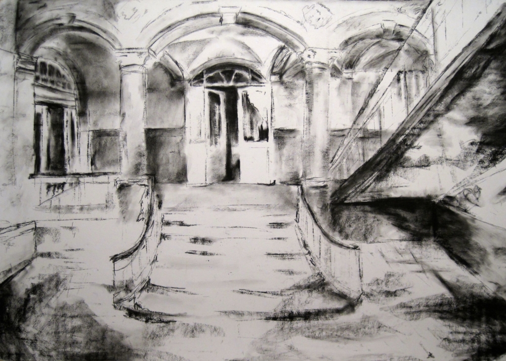 An atmospheric black and white charcoal drawing of a run down but architecturally interesting room. Most of the space is lost in shadows but a beam of light falls around the centre, illuminating a staircase and a mysterious half-open door.