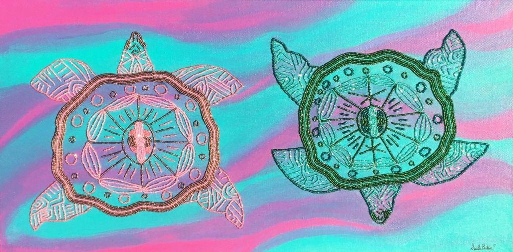 A painting full of turquoise and pink tones in wave-like broad strokes. On top of this acrylic-painted background, there are two turtles of the same size, one in pink and one in green, facing up and down respectively. The turtles are made up of mesmerizing, sparkling beaded patterns.